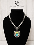 Iridescent heart pendant with Navajo inspired round beads