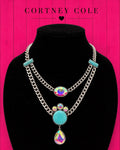 Desert Dusk Boutique Necklace — Double Strand Metal with Turquoise & Iridescent Rhinestone Drop Pendant